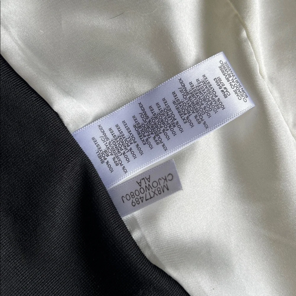 Cream and black quilted fitted vest by Calvin Klein with ribbed knit details sm - Picture 8 of 11